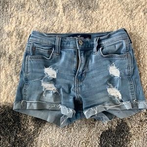 Light Wash Distressed Mid-Rise Jean Shorts